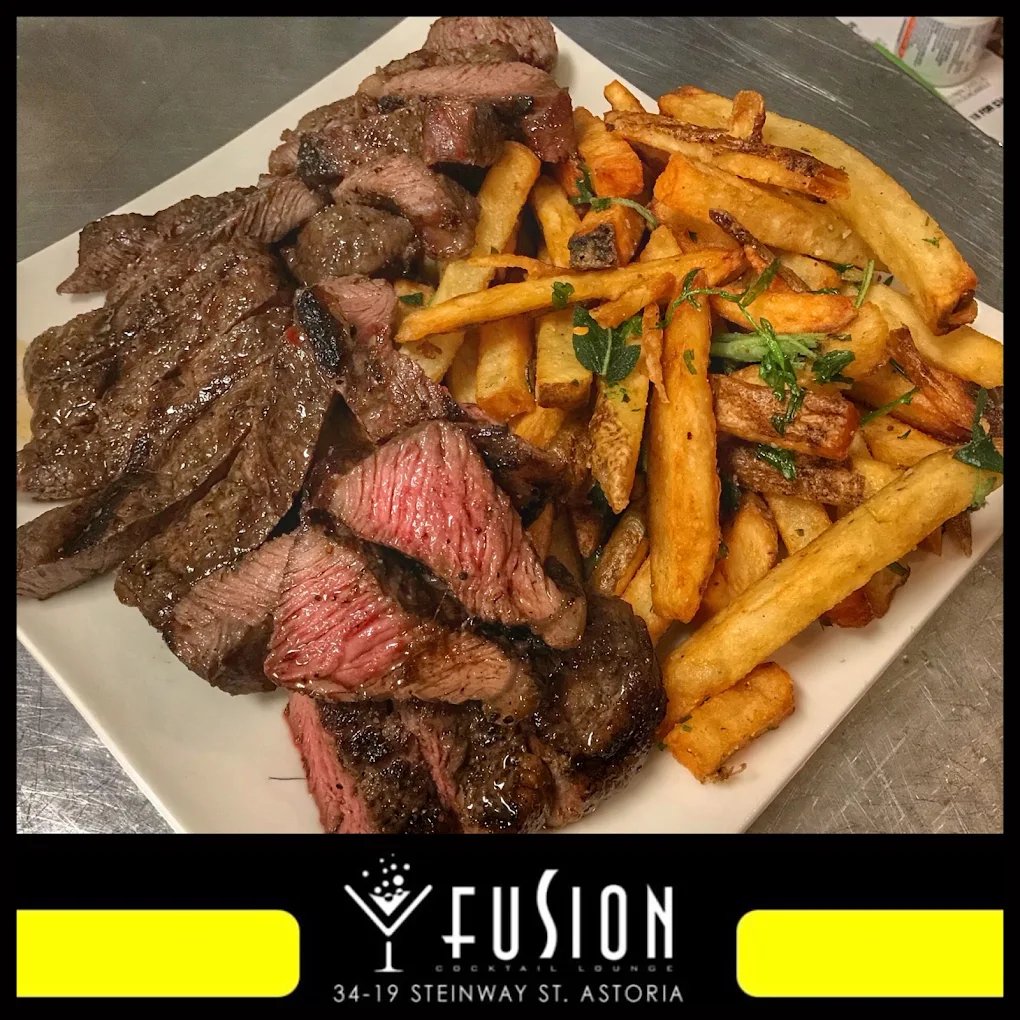 Grilled steak and crispy fries at Fusion Lounge NY